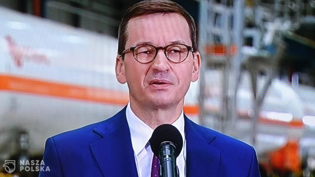 Morawiecki: wychodzimy z pandemii powoli, poobijani, ale niepokonani