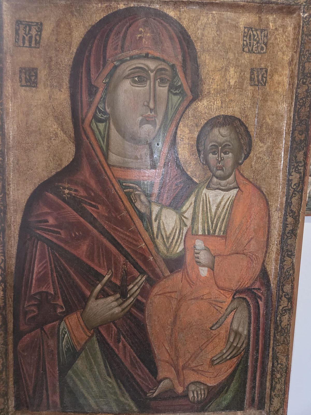 Ikona Matki Bożej Hodegetrii, na której Bogurodzica wskazuje dłonią na Dzieciątko trzymające zwój